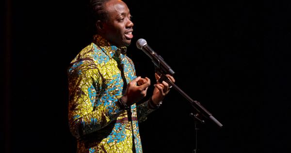 Student speaking in to the microphone