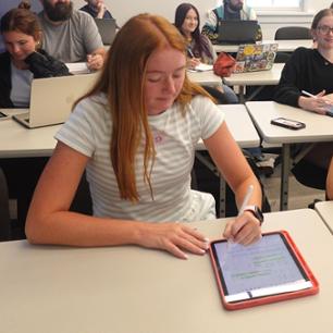 This student si taking notes for a Calculus 1 class.
