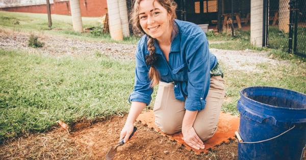 An ETSU Geosciences student digging for fossils