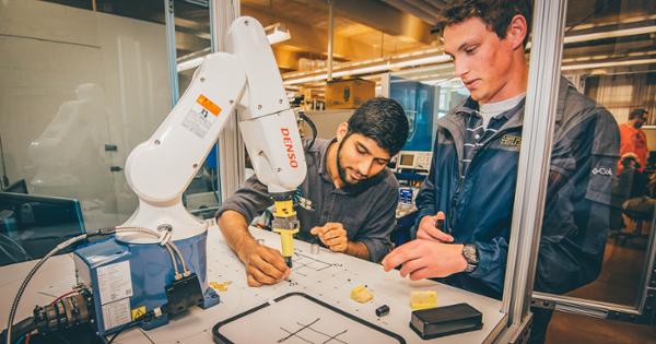 ETSU engineering students using equipment in a lab