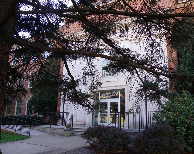 The front of ETSU's education building, Warf-Pickel, including the etched glass with the Clemmer College name.