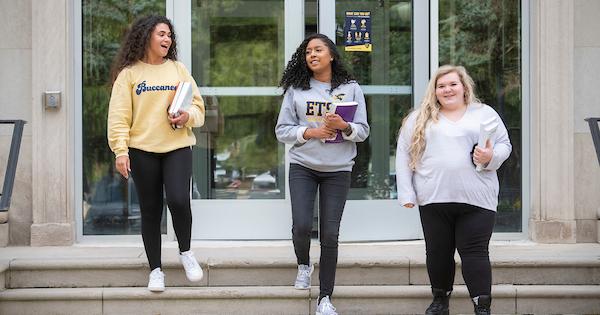 Photograph of Students on the front steps of Warf-Pickel