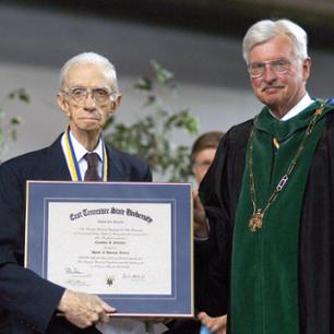 Claudius Clemmer receives his honorary doctorate.