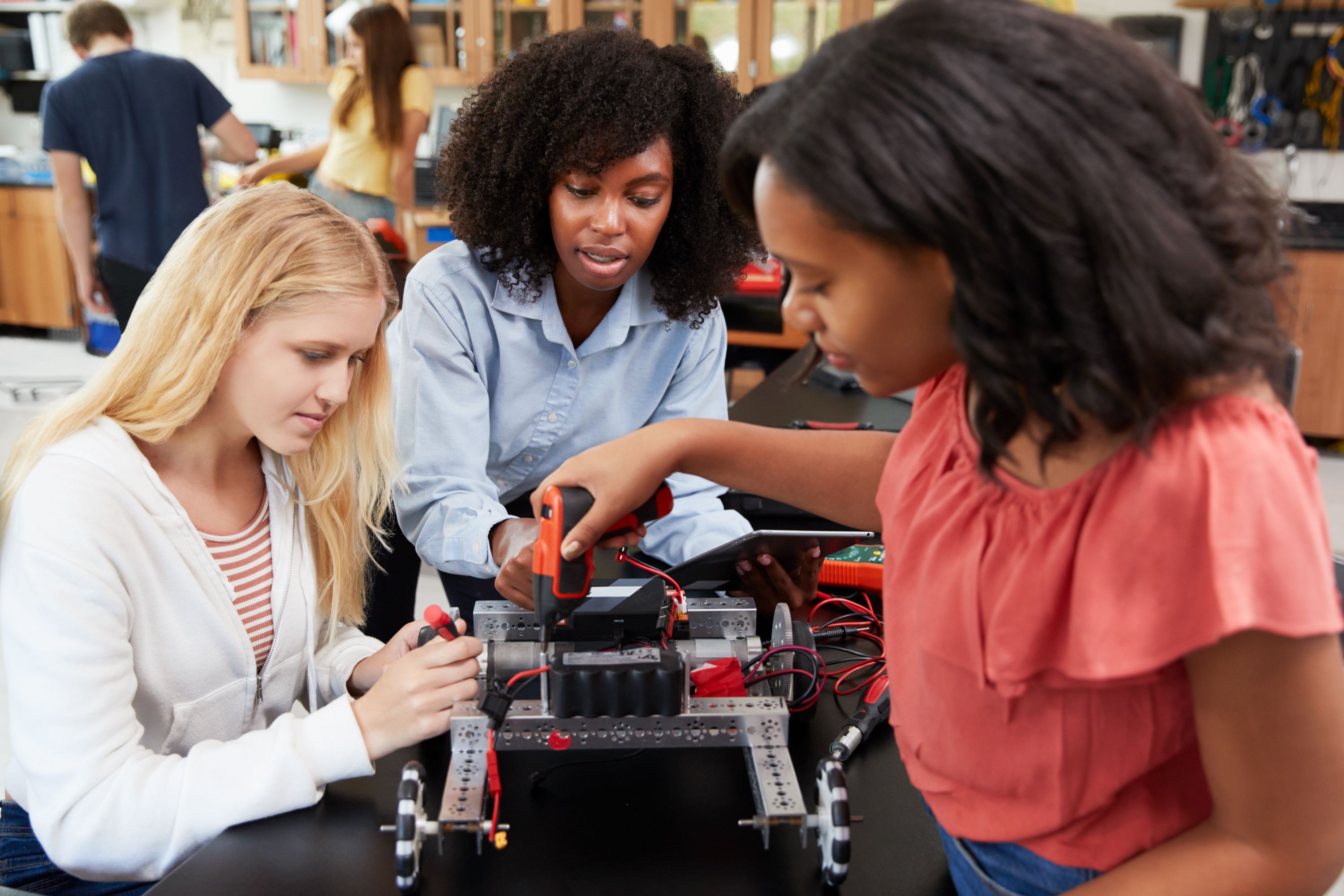 women working on engineering project