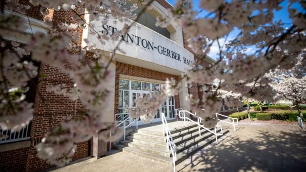 Stanton-Gerber building showing the cherry blossoms.