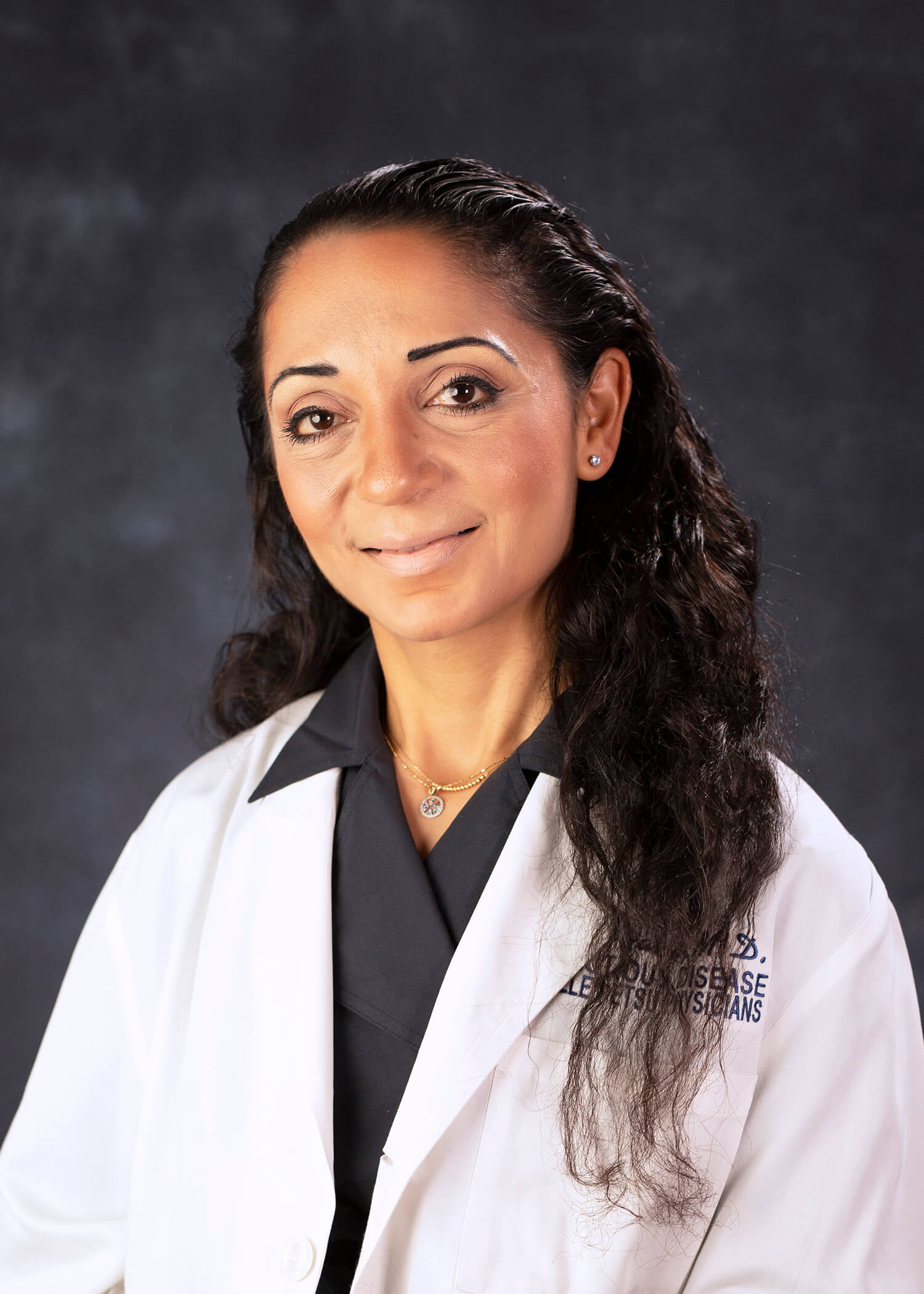 Photo of Dima Youssef, MD Professor