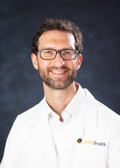 Photo of Evan Los, MD Associate Professor