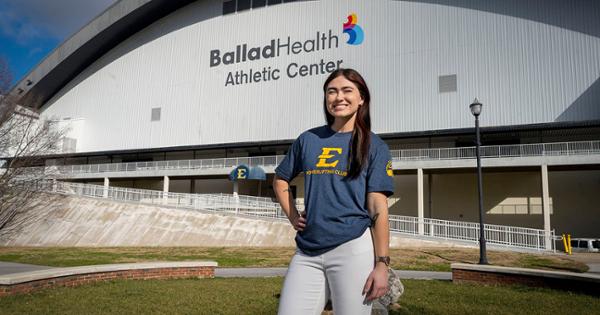 ETSU student Hannah Burkhart standing outside the Ballad Health Athletic Center