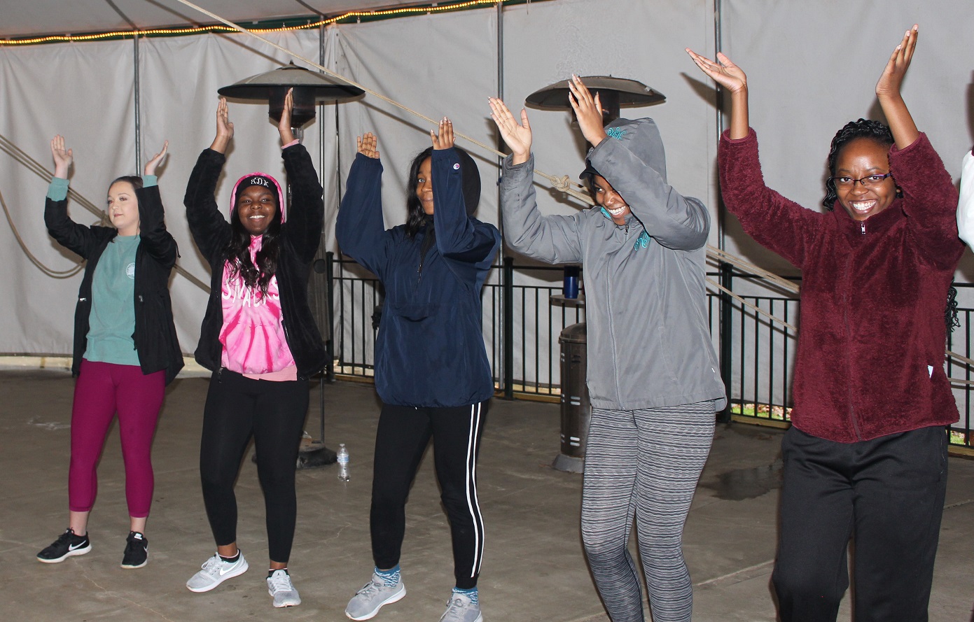 QUEST program members shown dancing.