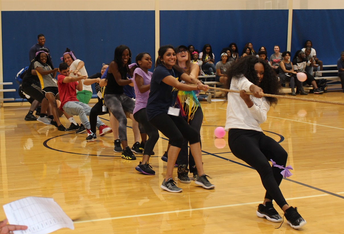 Students playing tug of war.