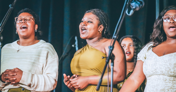 Members of the Gospel Choir sing.