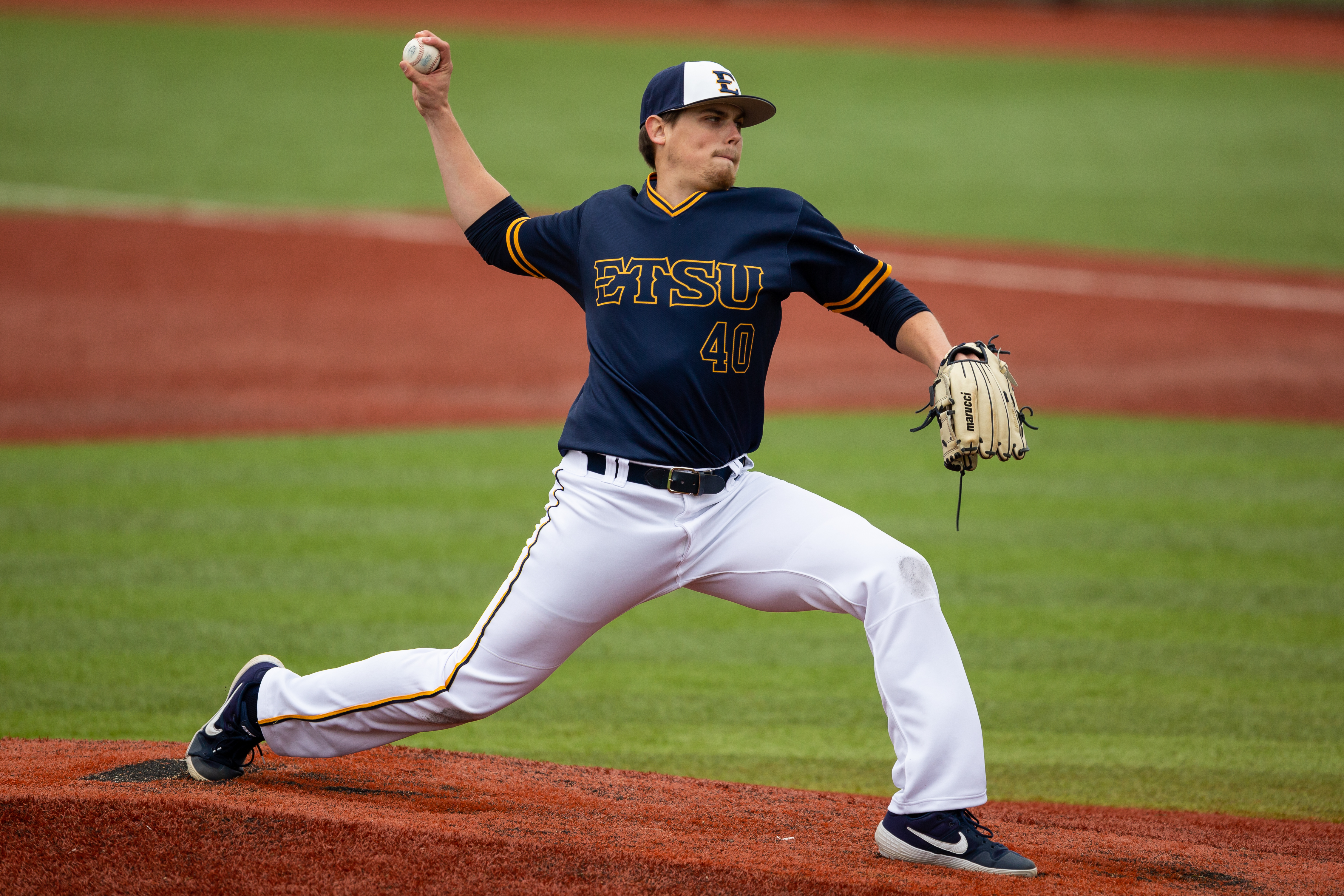 Landon Knacks pitches for the ETSU Buccaneers baseball team.