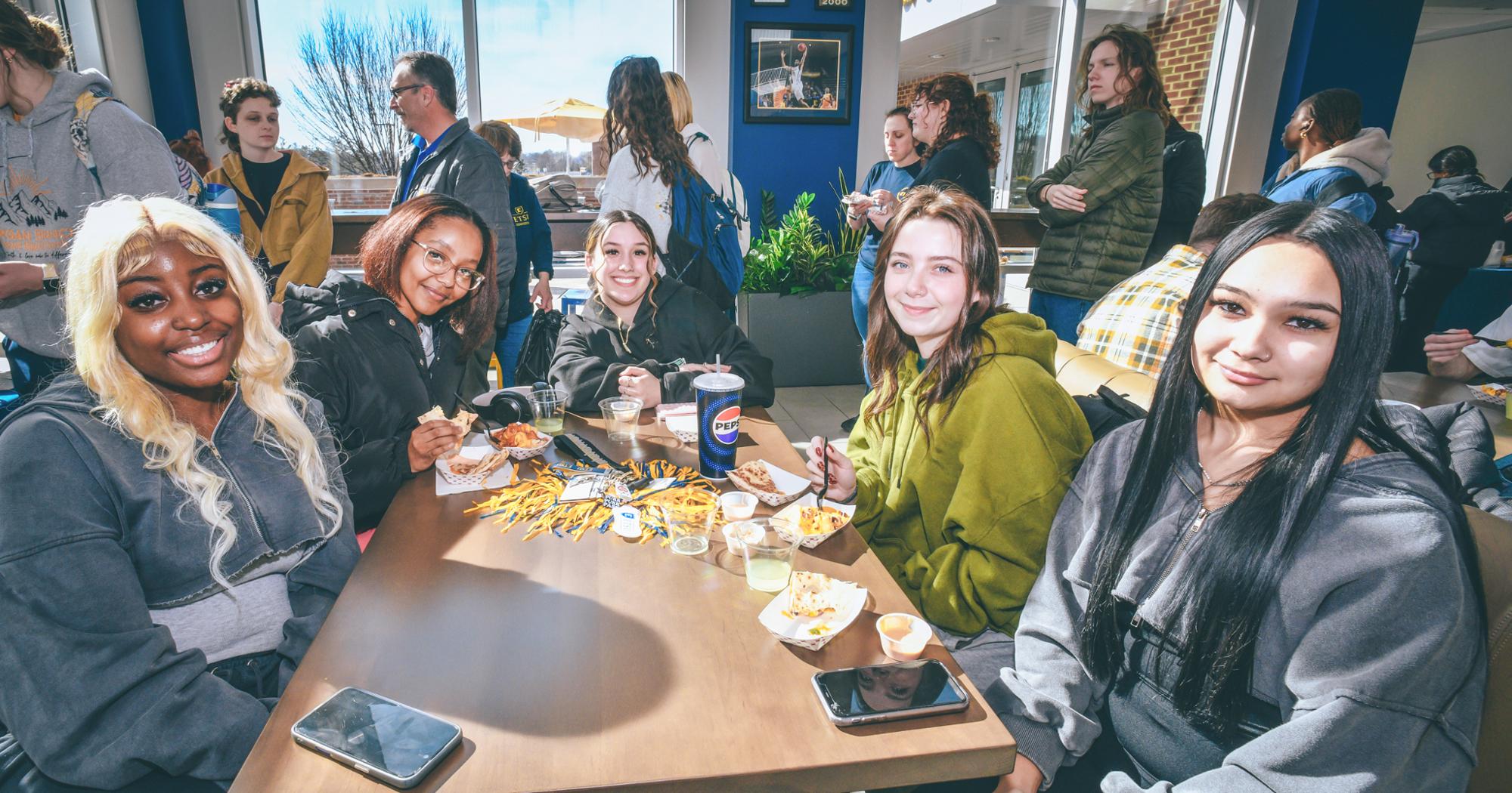 A group of students in Pepper's Grill.