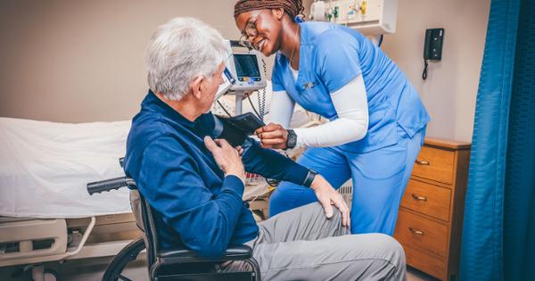 A nurse taking a patient's blood pressure reading