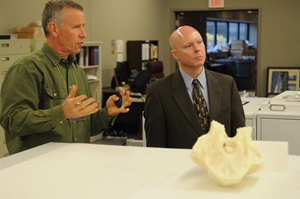 Representative David Hawk talks with Gray Fossil Site employee