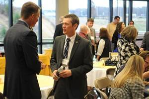 President Brian Noland talks with State Representative Tilman Goins