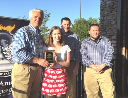 College Republicans award presentation being made to student