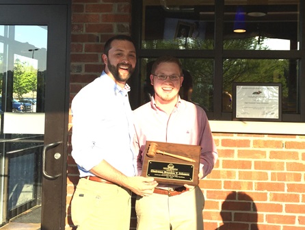 Sean Hoyle presents Chairman Brandon Johnson an award in honor of his service to the ETSU College Republicans.