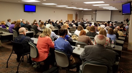 Audience listens to discussion between 3 Star Healthy Task Force members