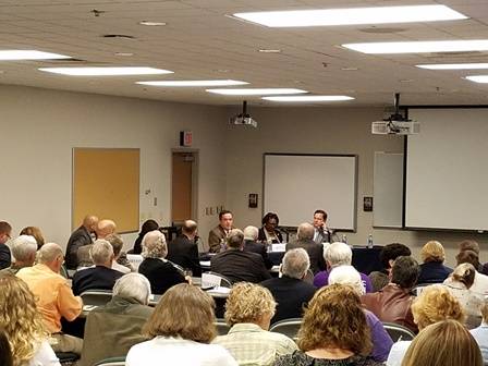 3 Star Healthy Project Task Force members Rep. Matthew Hill, Rep. Karen Camper, and Rep. Cameron Sexton sit at table facing audience to listen to public discussion and expert presentations concerning expansion of Medicaid in TN