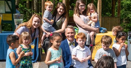 Dr. Nolan with children from Little Bucs