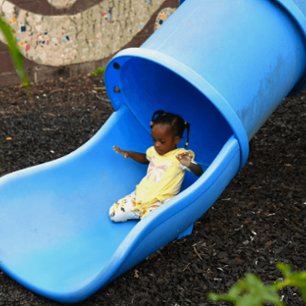 child on a slide