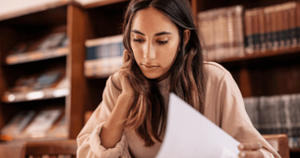 Female student studying a book
